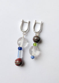 Pair of earrings with beads on a white background